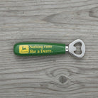Jones Peak John Deere green wooden bottle opener with yellow logo and text "Nothing runs like a Deere."