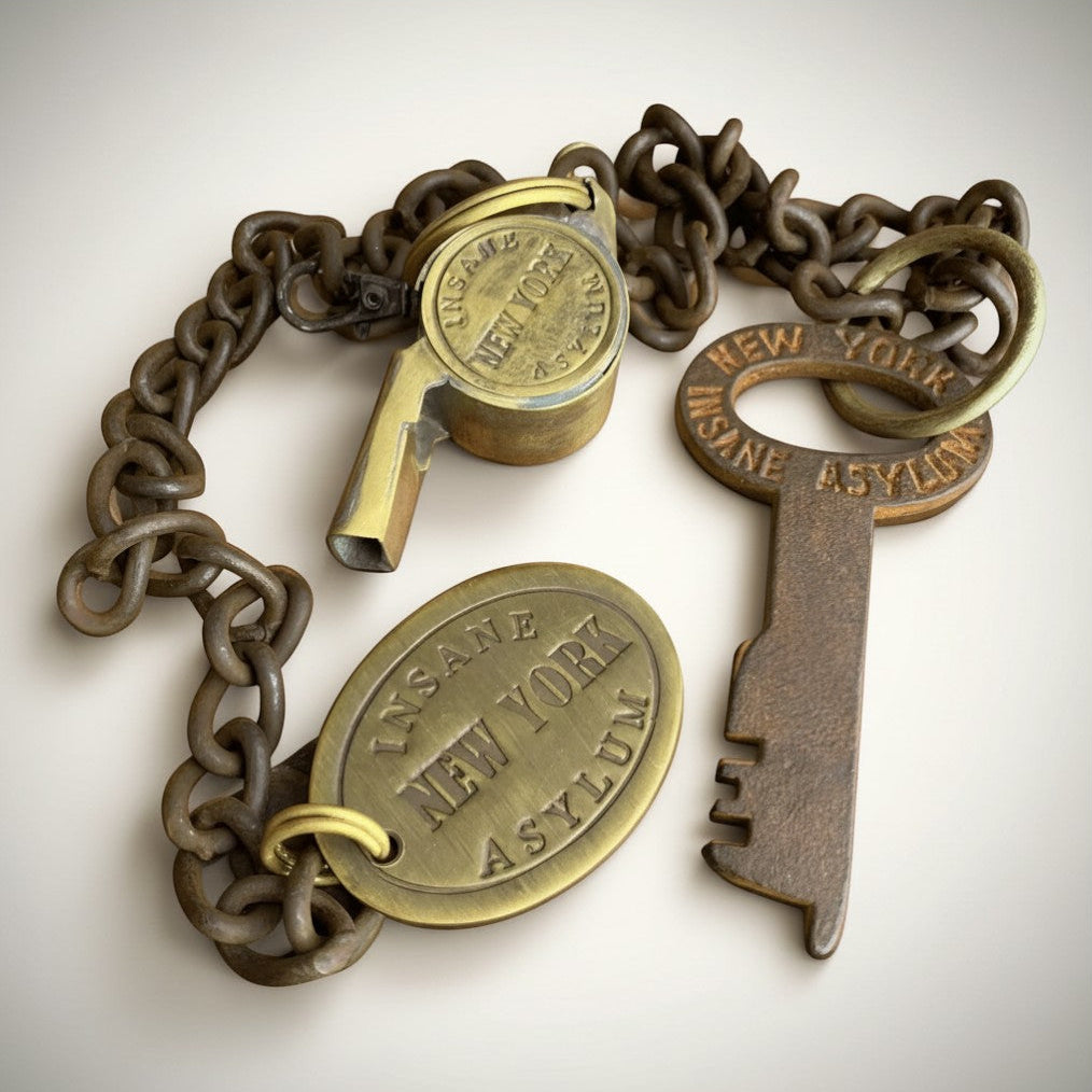 Jones Peak New York Insane Asylum guard key and whistle set with a heavy chain and oval tag, cast iron with antiqued patina.