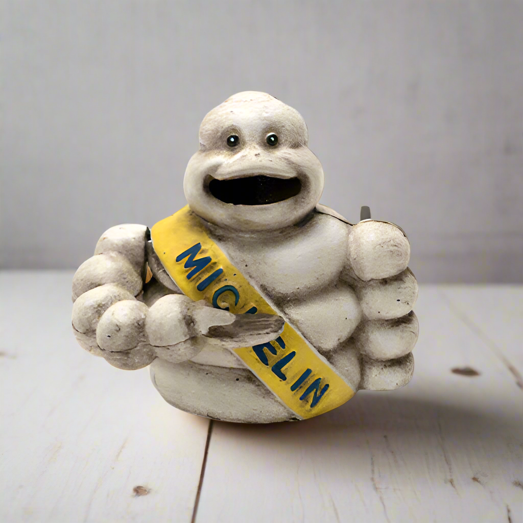 Tire Man Cast Iron Mechanical Coin Bank With Painted Antique Finish (4.5" x 5.5")