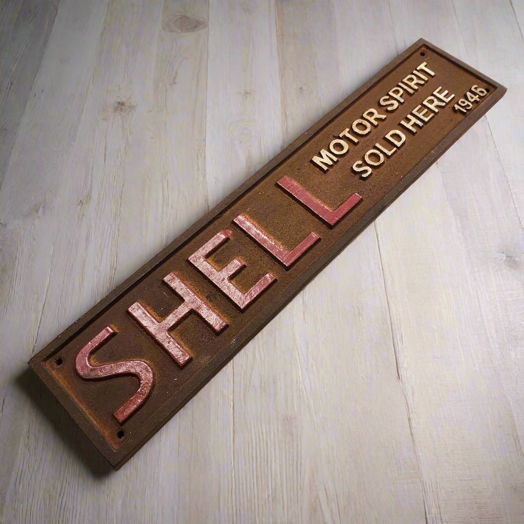 Shell 1946 Cast Iron Embossed Plaque With Painted Antique Finish (13.25" x 3") - Jones Peak