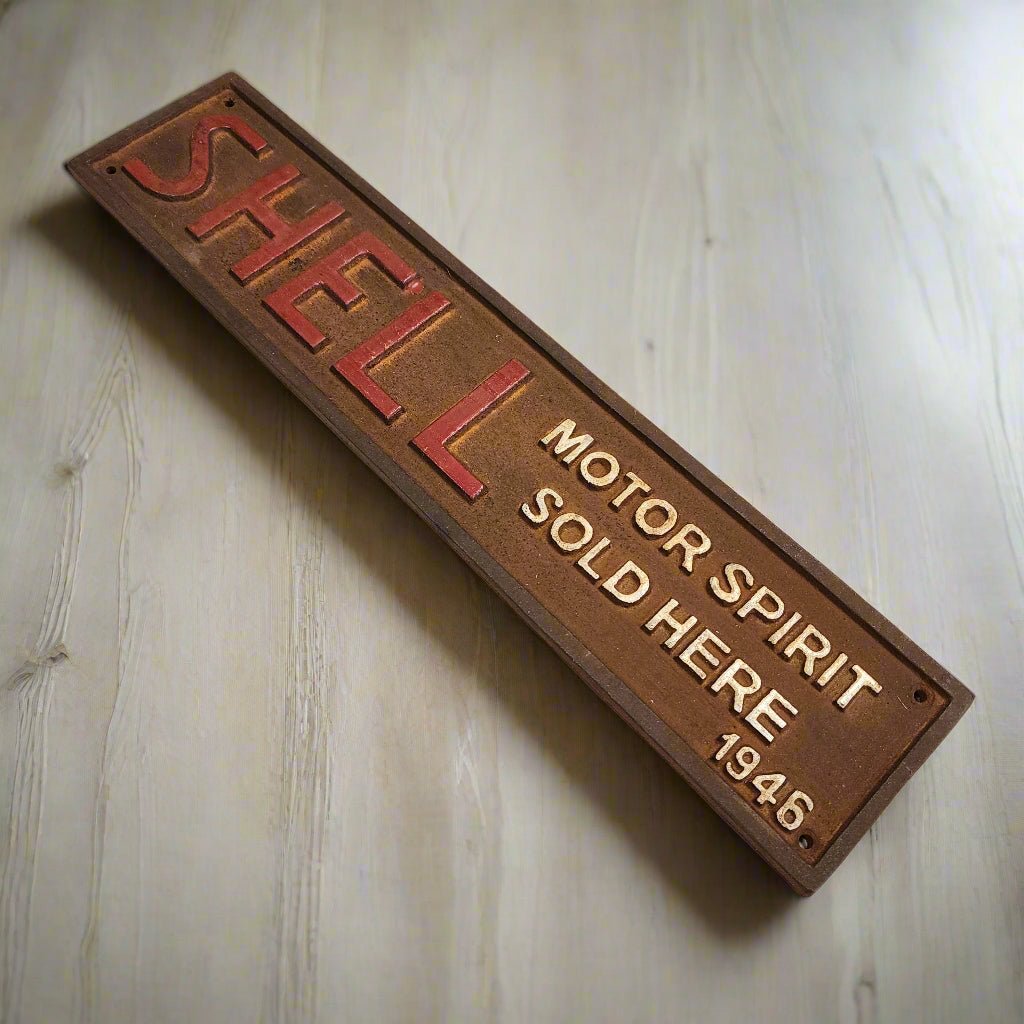 Shell 1946 Cast Iron Embossed Plaque With Painted Antique Finish (13.25" x 3") - Jones Peak