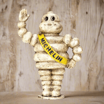 Tire Man Cast Iron Coin Bank With Painted Antique Finish (8.5" x 6") - Jones Peak