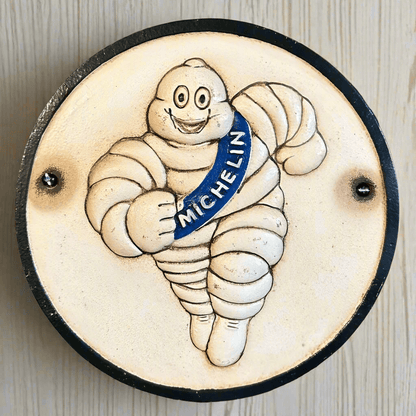 Tire Man Cast Iron Plaque With Painted Antique Finish (9.5 Round) - Jones Peak