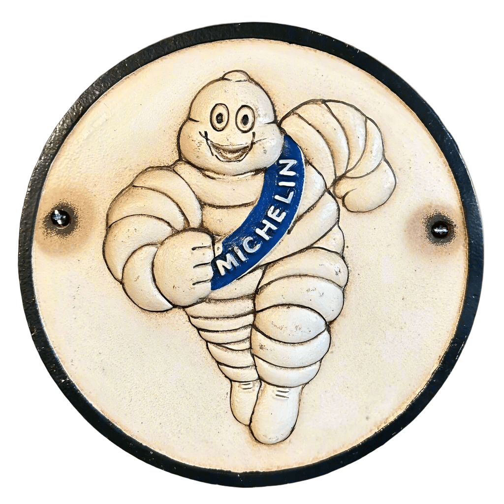 Tire Man Cast Iron Plaque With Painted Antique Finish (9.5 Round) - Jones Peak