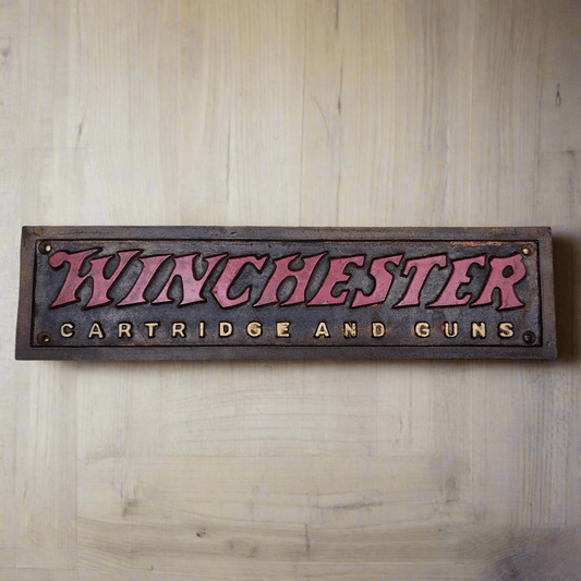 Winchester Cartridges And Guns Cast Iron Plaque With Painted Antique Finish (13.5" x 3") - Jones Peak