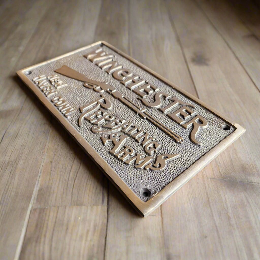 Winchester Repeating Arms Solid Brass Plaque With Raised Lettering (6.75" x 3.75") - Jones Peak